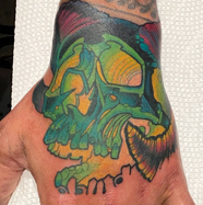 Bright_ Bold_Skull_Hand_Tattoo.JPG